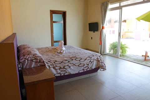 Deluxe Suite, 1 King Bed, Pool View | Desk, bed sheets, wheelchair access