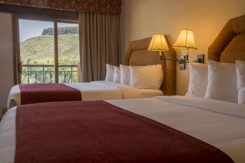 Premium bedding, pillowtop beds, desk, laptop workspace