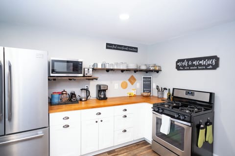 Microwave, toaster, dishes, coffee, spices