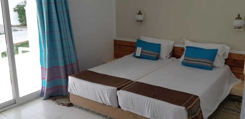 Double Room | Desk, blackout drapes, iron/ironing board, free cribs/infant beds