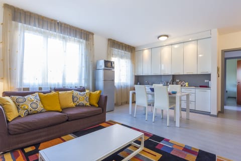 Apartment, 1 Bedroom | Living area | Flat-screen TV