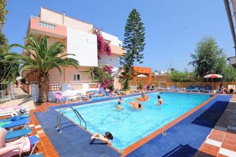 Outdoor pool, open 9:00 AM to 8:00 PM, free cabanas, pool umbrellas