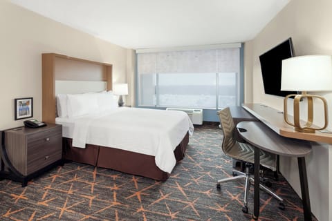 Premium bedding, down comforters, pillowtop beds, in-room safe