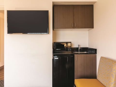 Suite, 1 King Bed, Non Smoking | Premium bedding, desk, iron/ironing board, free cribs/infant beds