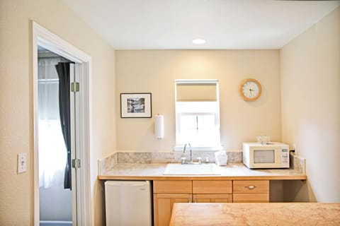 Premium Suite, 2 Bedrooms, Kitchenette | Private kitchen | Mini-fridge, microwave, coffee/tea maker, electric kettle