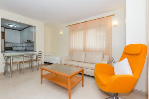 Standard Apartment, 1 Bedroom | Living room | Flat-screen TV
