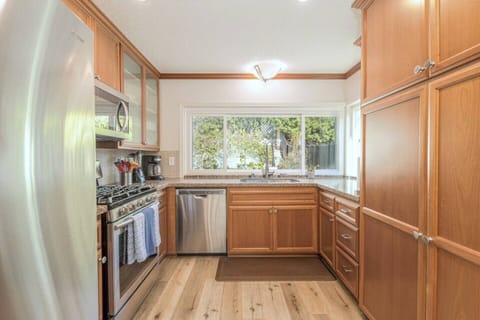 Gourmet Kitchen with top of the line appliances and cooking utensils