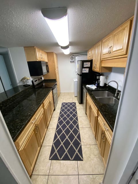 Condo, 3 Bedrooms, Balcony, Partial Ocean View (321) | Private kitchen | Full-size fridge, oven, stovetop, dishwasher