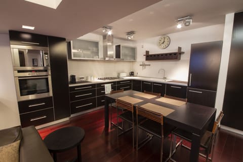 Luxury Apartment, 2 Bedrooms | Private kitchen | Fridge, microwave, stovetop, coffee/tea maker