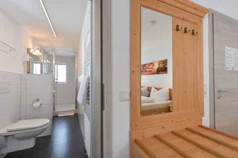 Double Room, Balcony | Bathroom | Shower, hair dryer, towels