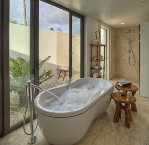 Luxury Garden Pool Villa | Bathroom | Separate tub and shower, free toiletries, hair dryer, slippers