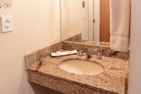 Shower, rainfall showerhead, hair dryer, towels