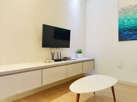 2 Bedroom Apartment | Living area | Flat-screen TV