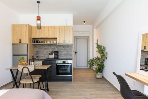 The kitchenette & dining area, elegantly designed.