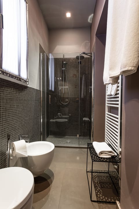 Junior Suite, 1 Bedroom, Balcony | Bathroom | Shower, rainfall showerhead, free toiletries, hair dryer