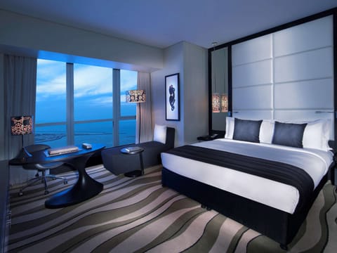 Luxury Room, 1 King Bed, Sea View | Minibar, in-room safe, individually decorated, individually furnished