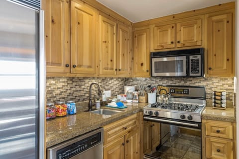 Fully stocked kitchen with snacks, waters, coffee, teas and more!