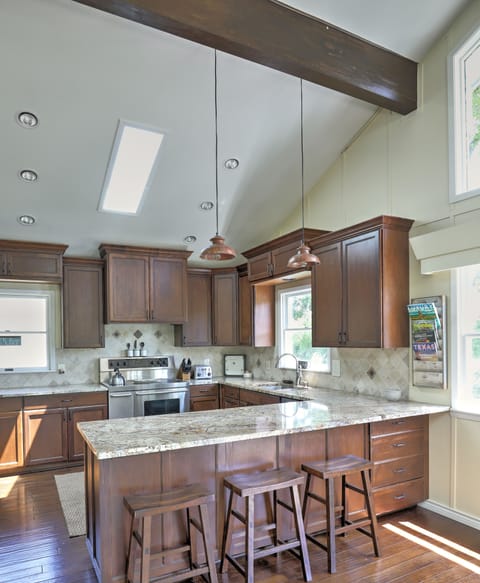 Kitchen with bar area for dining