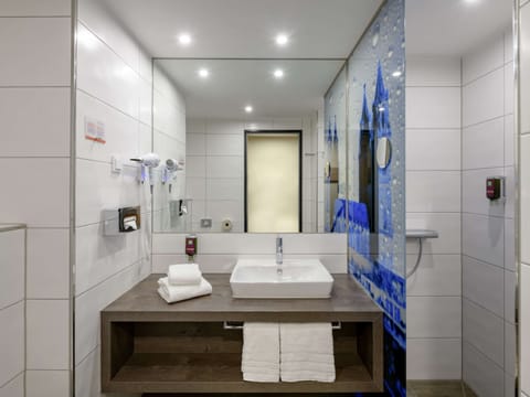 Shower, eco-friendly toiletries, hair dryer, towels