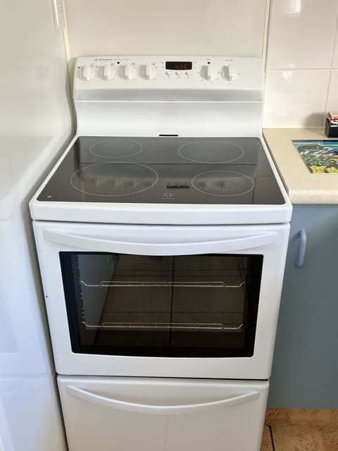 Two Bedroom Apartment | Private kitchen | Fridge, microwave, stovetop, electric kettle