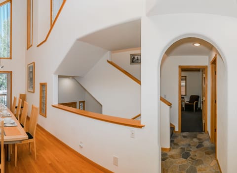 Off the Living Room is the Entrance Below, Master Bedroom Across, and Shared Bathroom