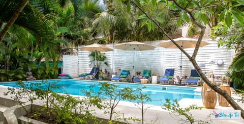 Outdoor pool, pool umbrellas, sun loungers