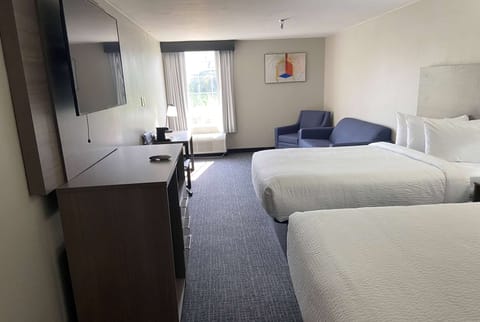 Suite, 2 Queen Beds, Non Smoking | Desk, laptop workspace, iron/ironing board, free WiFi
