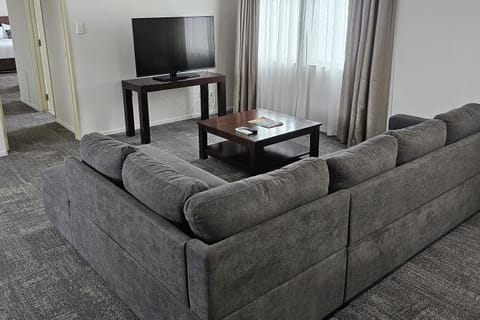 Family Apartment, 3 Bedrooms | Living area | LCD TV