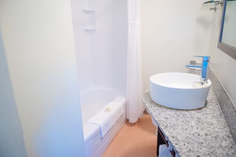 Standard Room, 2 Double Beds | Bathroom | Combined shower/tub, free toiletries, hair dryer, towels