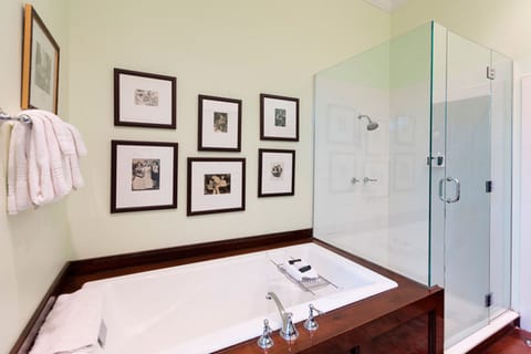 Deluxe Room, 1 King Bed | Bathroom | Designer toiletries, hair dryer, bathrobes, towels