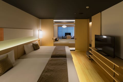 Suite Main Building | Premium bedding, down comforters, memory foam beds, in-room safe