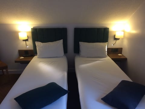 Standard Triple Room | Pillowtop beds, iron/ironing board, free WiFi, bed sheets