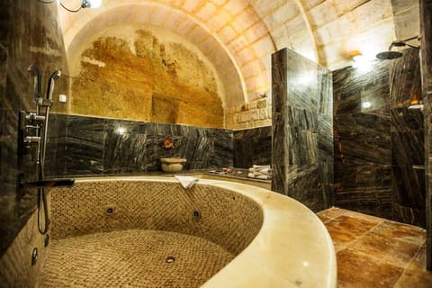 Premium King Cave Suite With Turkish Bath | Bathroom | Separate tub and shower, jetted tub, rainfall showerhead, hair dryer