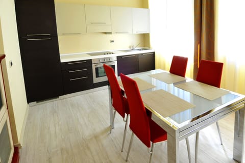 Standard Apartment (4 people) | Private kitchen | Full-size fridge, microwave, stovetop, electric kettle