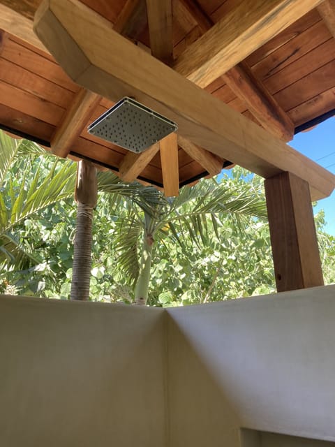 Indoor/outdoor shower in bungalow