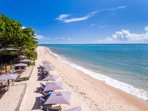 On the beach, sun loungers, beach umbrellas, snorkeling