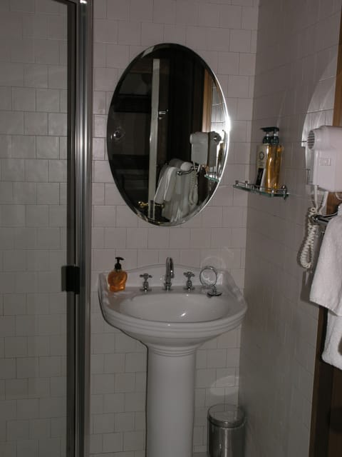 Irvine Room | Bathroom | Designer toiletries, hair dryer, towels