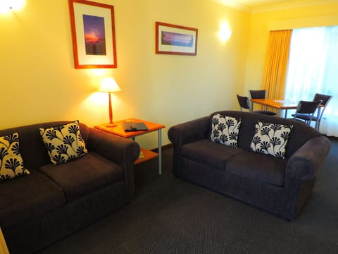 Standard Cabin, 1 Bedroom | Living area | Flat-screen TV, DVD player