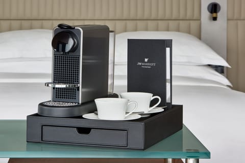 Premium bedding, down comforters, minibar, in-room safe