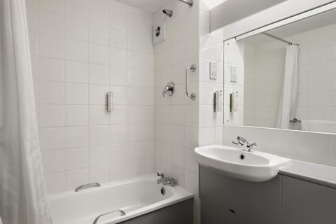 Combined shower/tub, eco-friendly toiletries, hair dryer, towels