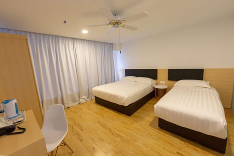 Deluxe Family Queen Room | Desk, blackout drapes, iron/ironing board, free WiFi