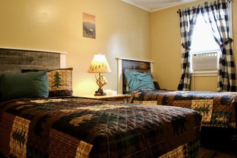 Standard Apartment, 2 Bedrooms, Kitchen, Partial Lake View | Blackout drapes, iron/ironing board, rollaway beds, free WiFi