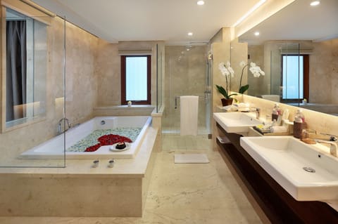 Suite, Balcony, Pool View | Bathroom | Separate tub and shower, deep soaking tub, free toiletries, hair dryer