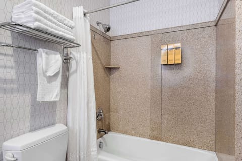 Suite, 1 King Bed, Non Smoking, Refrigerator & Microwave (with Sofabed) | Bathroom | Combined shower/tub, designer toiletries, hair dryer, towels