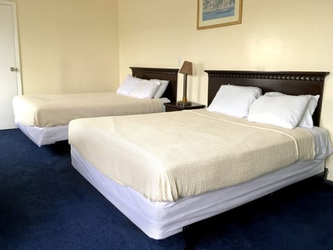 Standard Room, 2 Double Beds | Individually furnished, desk, free WiFi, bed sheets