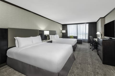 1 bedroom, hypo-allergenic bedding, down comforters, in-room safe