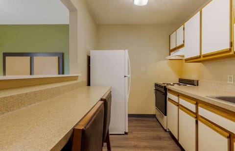 Deluxe Studio, 1 Queen Bed with Sofa bed, Non Smoking | Private kitchen | Full-size fridge, microwave, stovetop