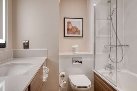 Deluxe Room, 2 Queen Beds, Non Smoking | Bathroom | Combined shower/tub, deep soaking tub, free toiletries, hair dryer