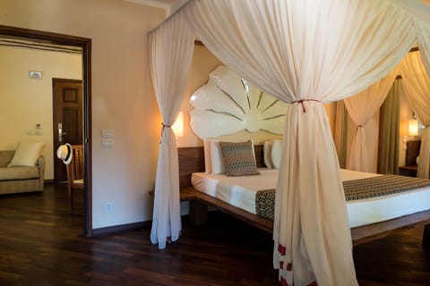 Superior Suite with Garden View | Premium bedding, minibar, in-room safe, individually decorated