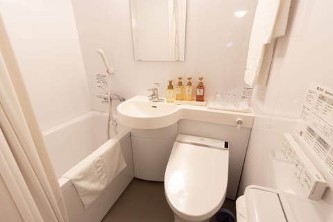 Combined shower/tub, free toiletries, hair dryer, bathrobes